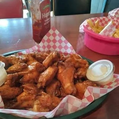 Wings and fries served at Christy’s Pub Grub