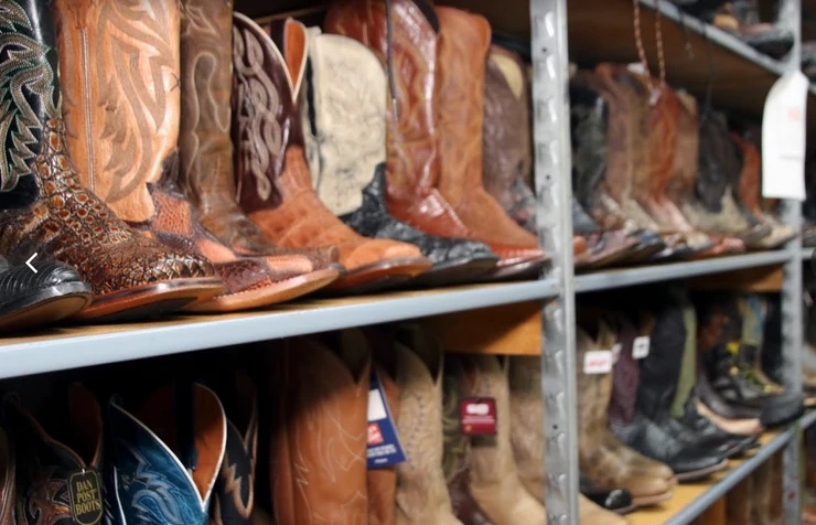 Rows of western boots inside French’s Shoes and Boots